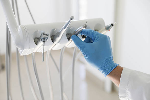 Professional Tooth Extraction technician working in Sheboygan, WI